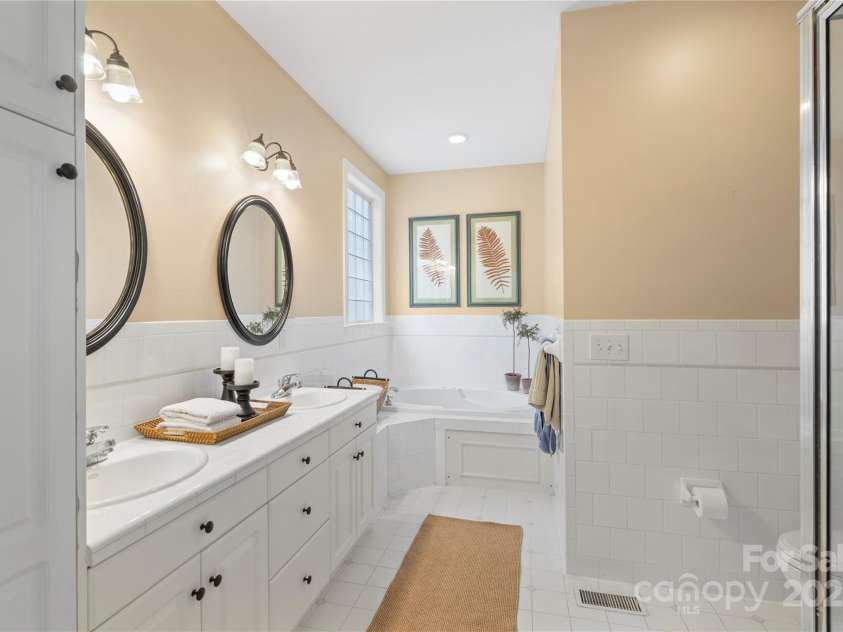 5712 Burck Drive, Concord, NC 28027.  MLS# CAR4277945, YatesRealty ID 27051. Primary Ensuite