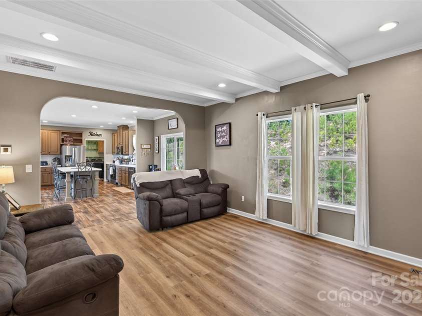 194 Love Drive, Marion, NC 28752.  MLS# CAR4280471, YatesRealty ID 27053. Living room/ Den