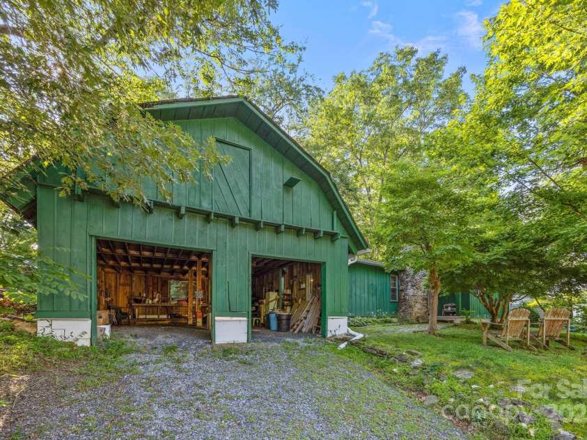 206 Carolina Avenue, Hendersonville, NC 28739.  MLS# CAR4279554, YatesRealty ID 27054. Barn style parking -