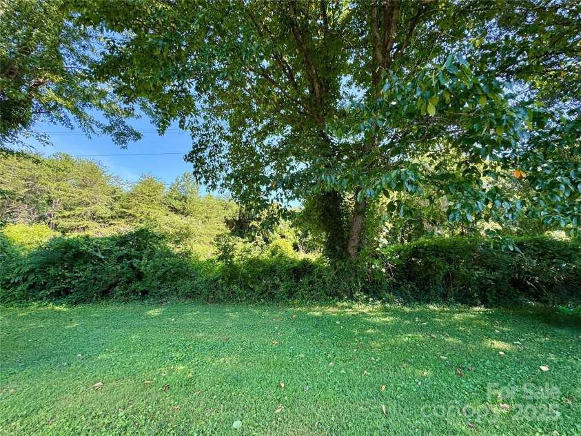 2500 Judith Avenue, Gastonia, NC 28054.  MLS# CAR4282124, YatesRealty ID 27057. Nature behind the back yard!