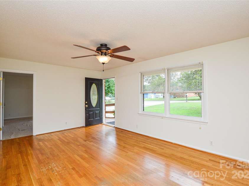 2500 Judith Avenue, Gastonia, NC 28054.  MLS# CAR4282124, YatesRealty ID 27057. Spacious living room with hardwoods