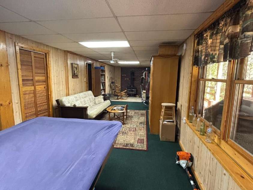 408 Dora Lane, Bakersville, NC 28705.  MLS# CAR4311694, YatesRealty ID 2706. Basement/family room