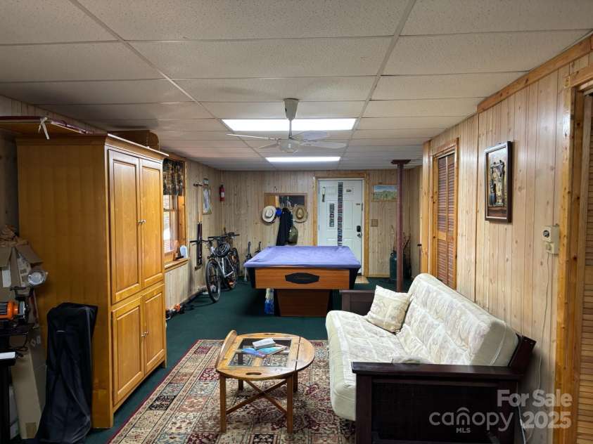 408 Dora Lane, Bakersville, NC 28705.  MLS# CAR4311694, YatesRealty ID 2706. Family room