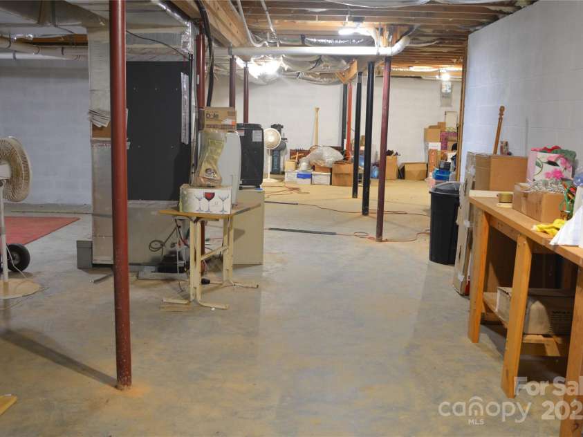 79 Connelly Road, Arden, NC 28704.  MLS# CAR4211499, YatesRealty ID 2706. Workshop with walkout in basement.