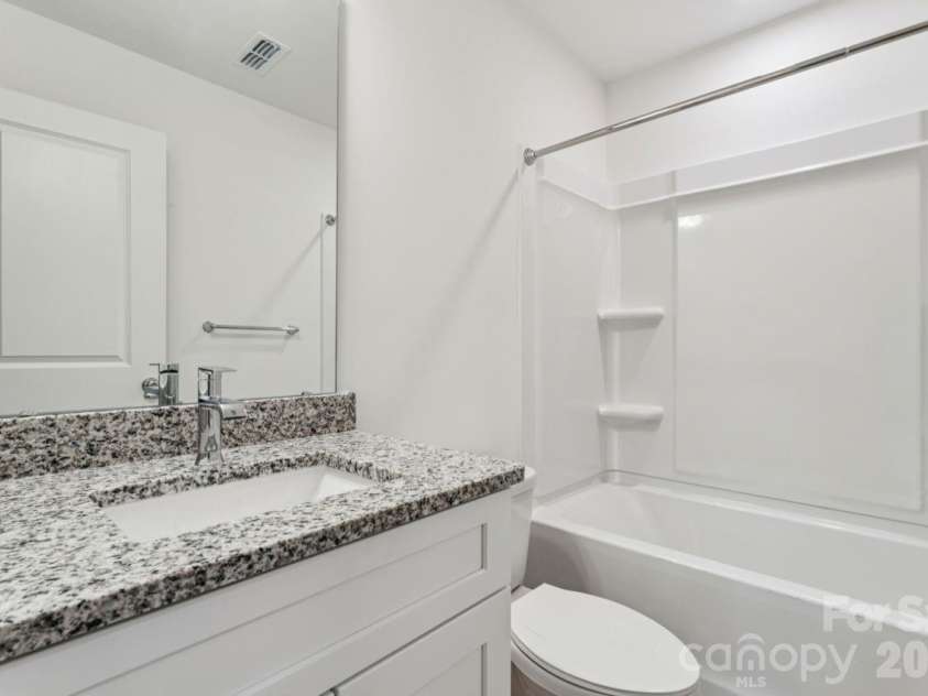 1005 Glenview Avenue, Gastonia, NC 28054.  MLS# CAR4384399, YatesRealty ID 27064. Guest Bathroom