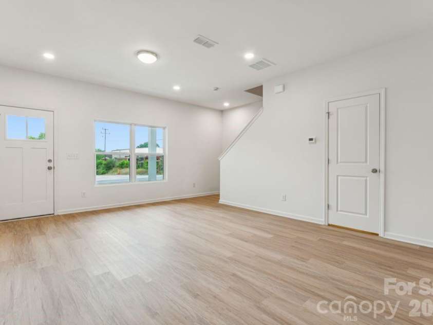 1005 Glenview Avenue, Gastonia, NC 28054.  MLS# CAR4384399, YatesRealty ID 27064. Living Room & Front Entrance