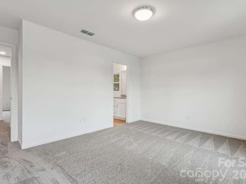 1005 Glenview Avenue, Gastonia, NC 28054.  MLS# CAR4384399, YatesRealty ID 27064. Primary Bedroom