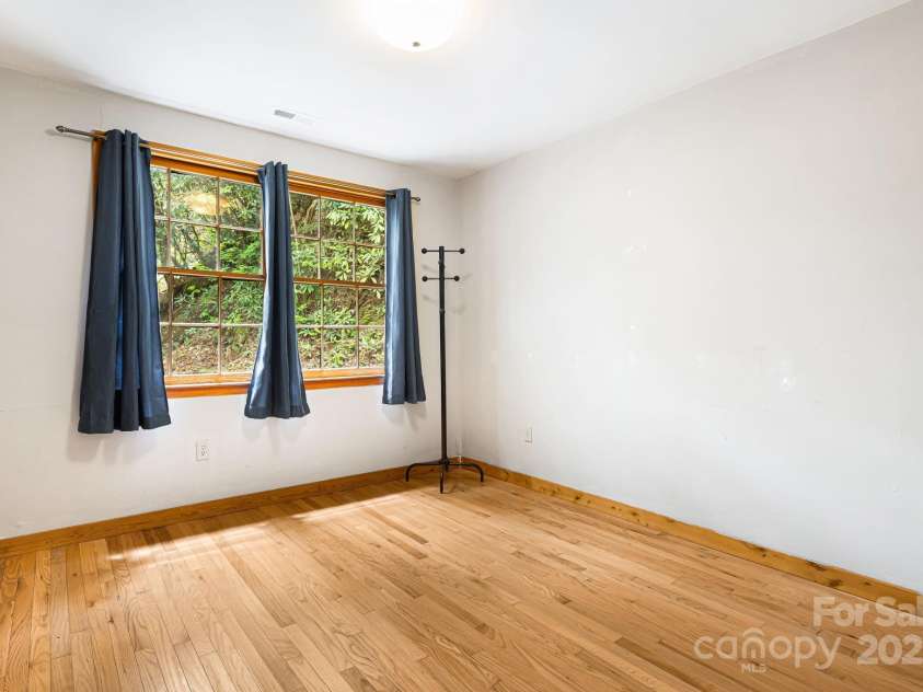 83 Snowy Cove Lane, Black Mountain, NC 28711.  MLS# CAR4255677, YatesRealty ID 27065. Bedroom 1