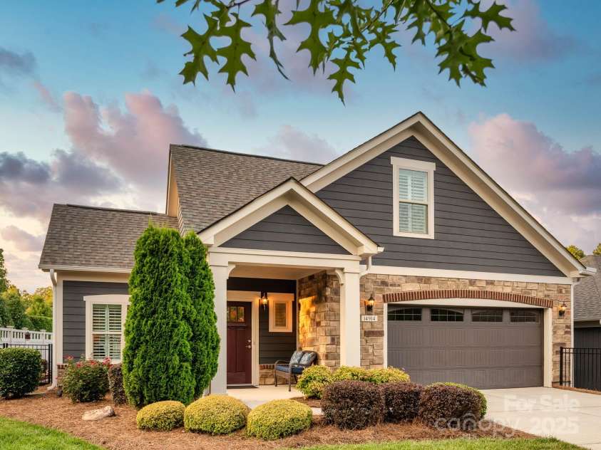 14914 Dewpoint Place, Huntersville, NC 28078.  MLS# CAR4279093, YatesRealty ID 27066. Charming front porch for bench or rocking chairs.
