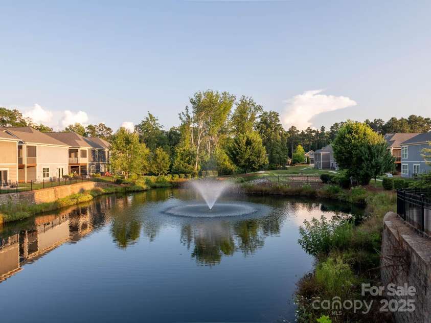 14914 Dewpoint Place, Huntersville, NC 28078.  MLS# CAR4279093, YatesRealty ID 27066. Gorgeous pond with water feature.