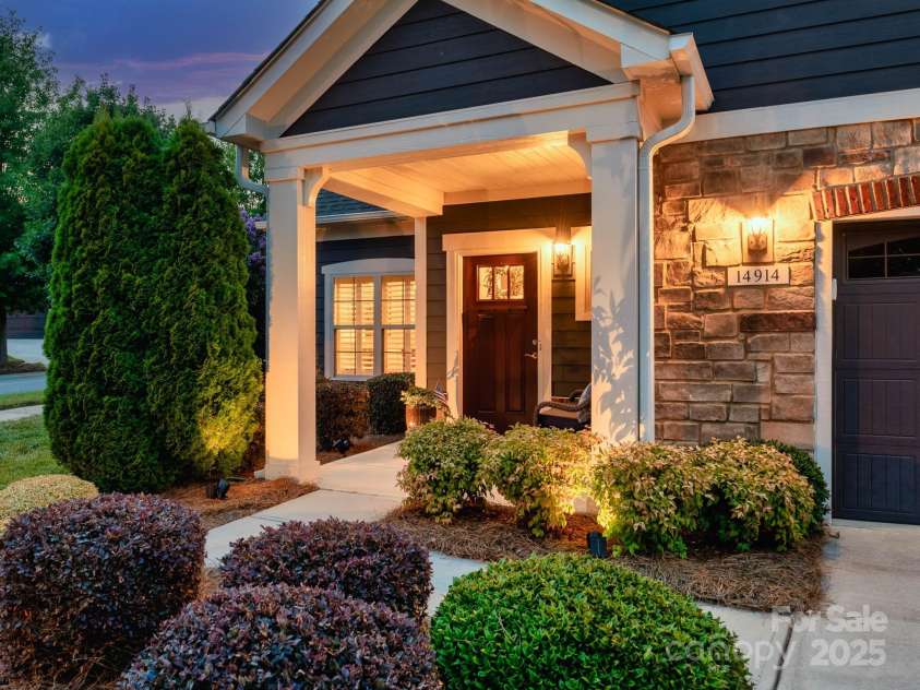 14914 Dewpoint Place, Huntersville, NC 28078.  MLS# CAR4279093, YatesRealty ID 27066. Lush, mature landscaping adds color and character.
