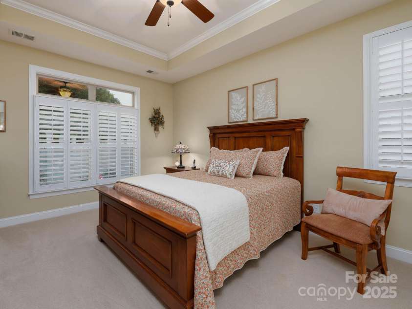 14914 Dewpoint Place, Huntersville, NC 28078.  MLS# CAR4279093, YatesRealty ID 27066. Primary suite -- plantation shutters throughout home. Trey ceiling with ceiling fan.