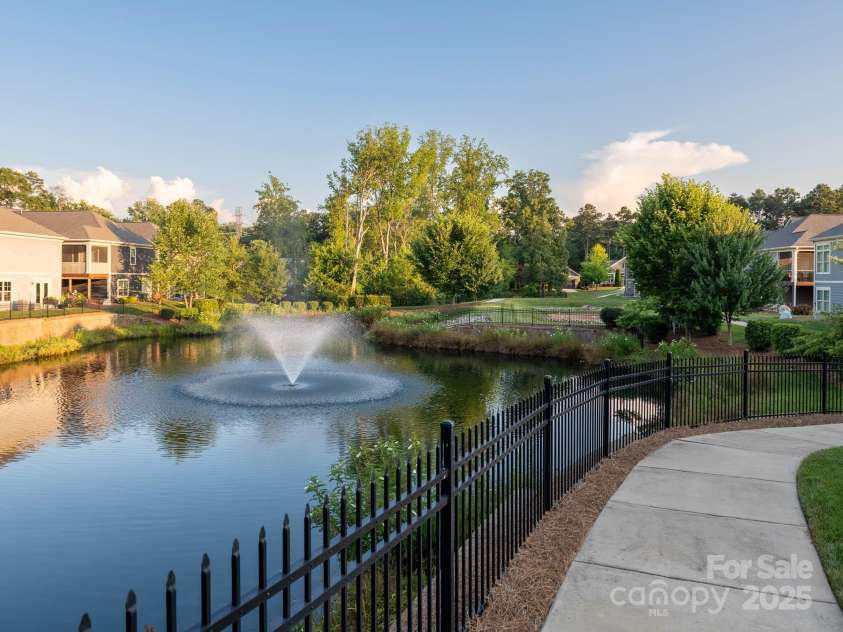 14914 Dewpoint Place, Huntersville, NC 28078.  MLS# CAR4279093, YatesRealty ID 27066. Walking path around the pond.