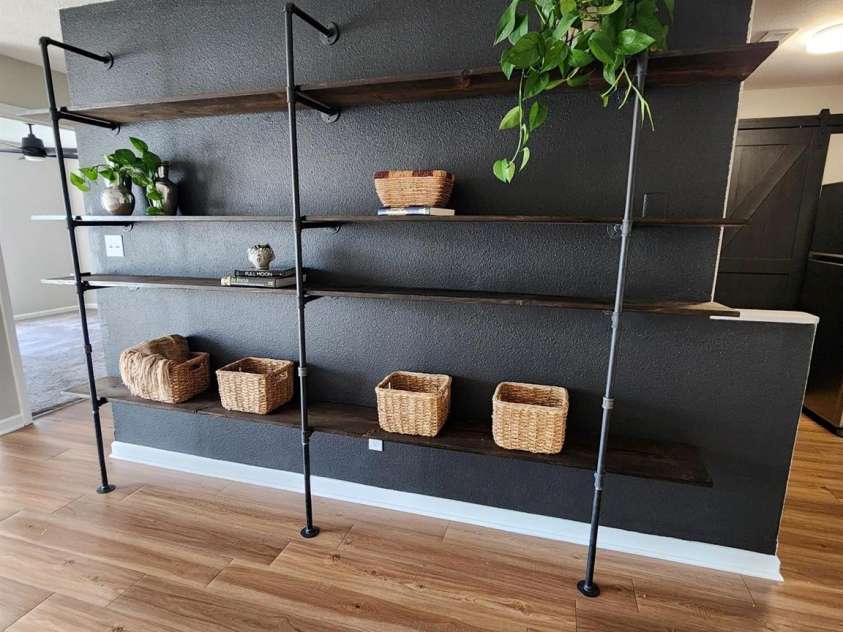 6423 Town Hall Place, Harrisburg, NC 28075.  MLS# CAR4241214, YatesRealty ID 2707. Modern accent wall with custom shelving.