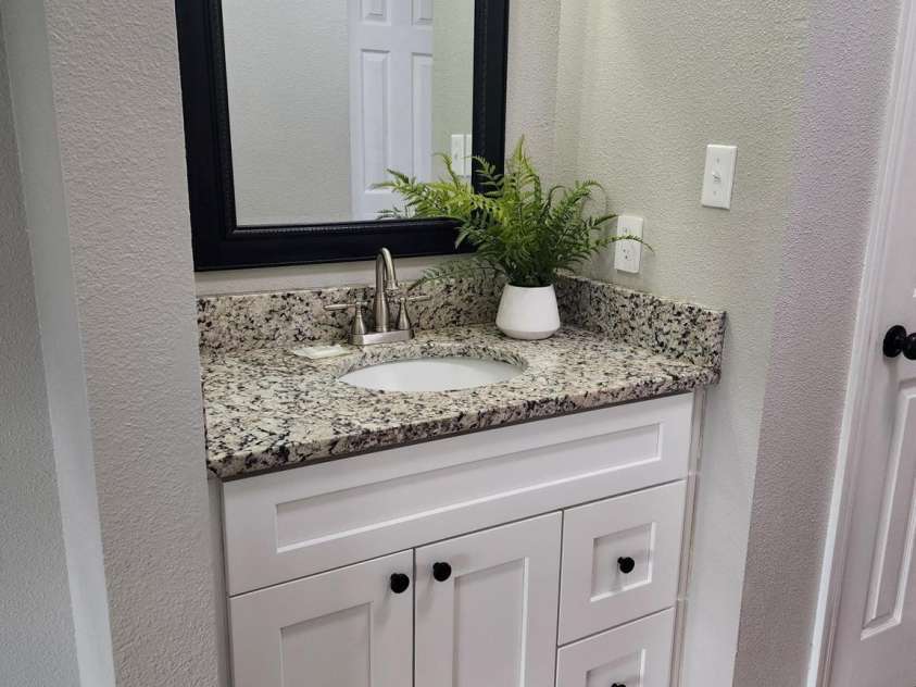 6423 Town Hall Place, Harrisburg, NC 28075.  MLS# CAR4241214, YatesRealty ID 2707. Primary Bath w/ two separate sink areas all updated.