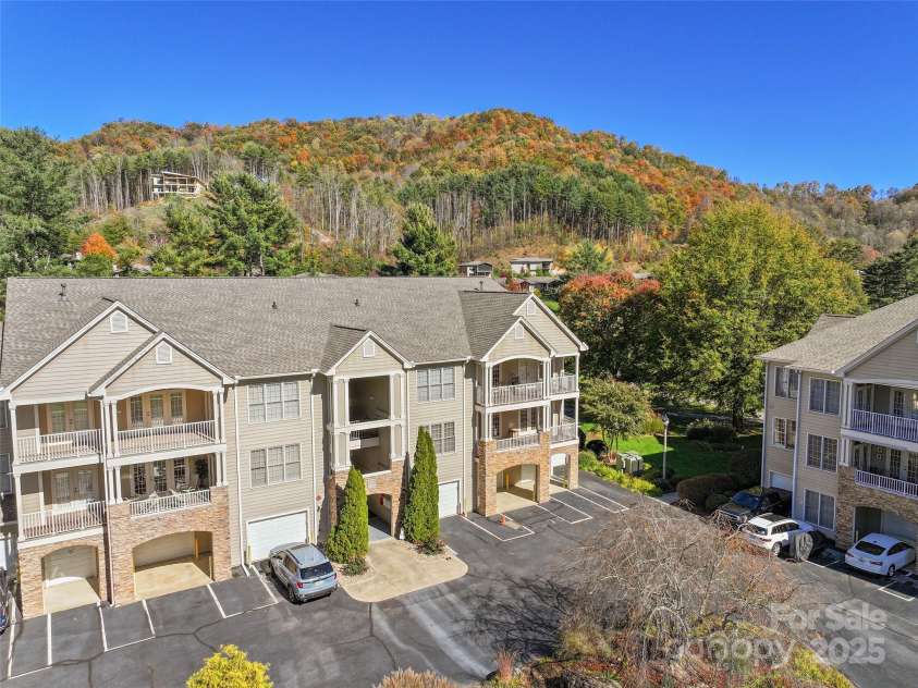 91 Glenview Lane, Maggie Valley, NC 28751.  MLS# CAR4312571, YatesRealty ID 2707. Another drone shot of building and views