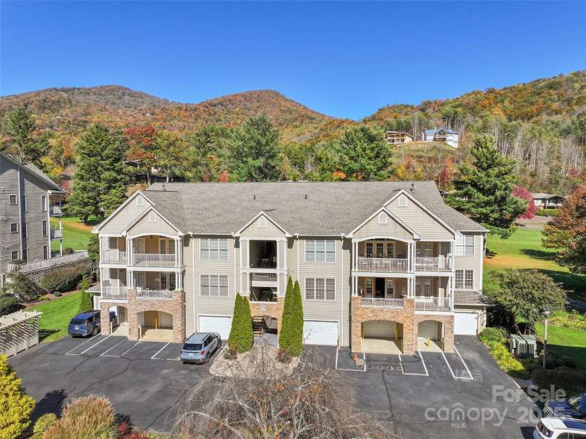 91 Glenview Lane, Maggie Valley, NC 28751.  MLS# CAR4312571, YatesRealty ID 2707. Drone shot of building