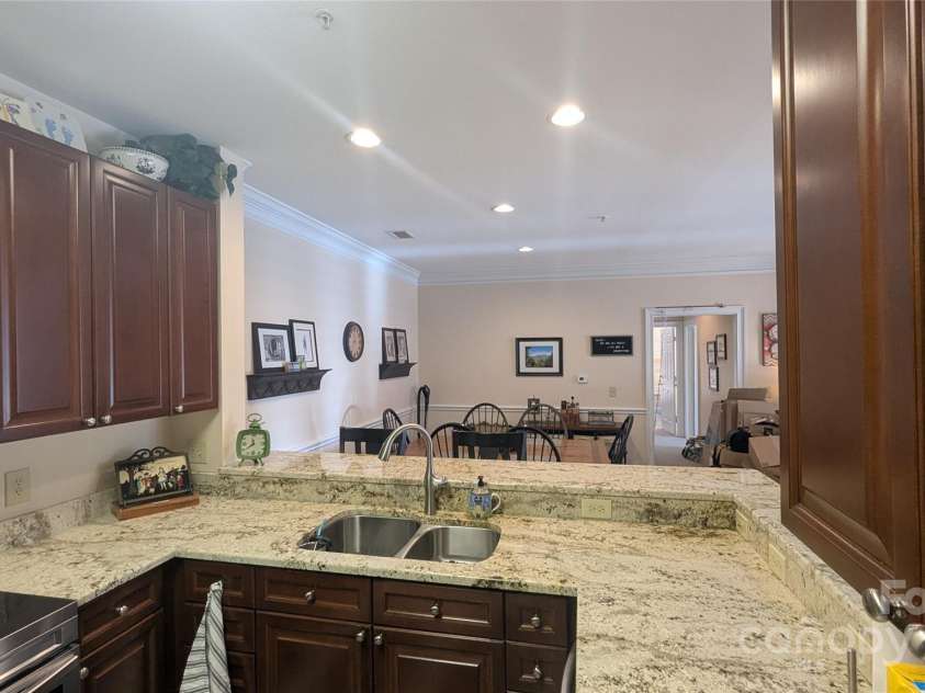 91 Glenview Lane, Maggie Valley, NC 28751.  MLS# CAR4312571, YatesRealty ID 2707. Kitchen to dining area