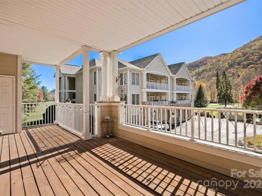 91 Glenview Lane, Maggie Valley, NC 28751.  MLS# CAR4312571, YatesRealty ID 2707. Views off expansive deck