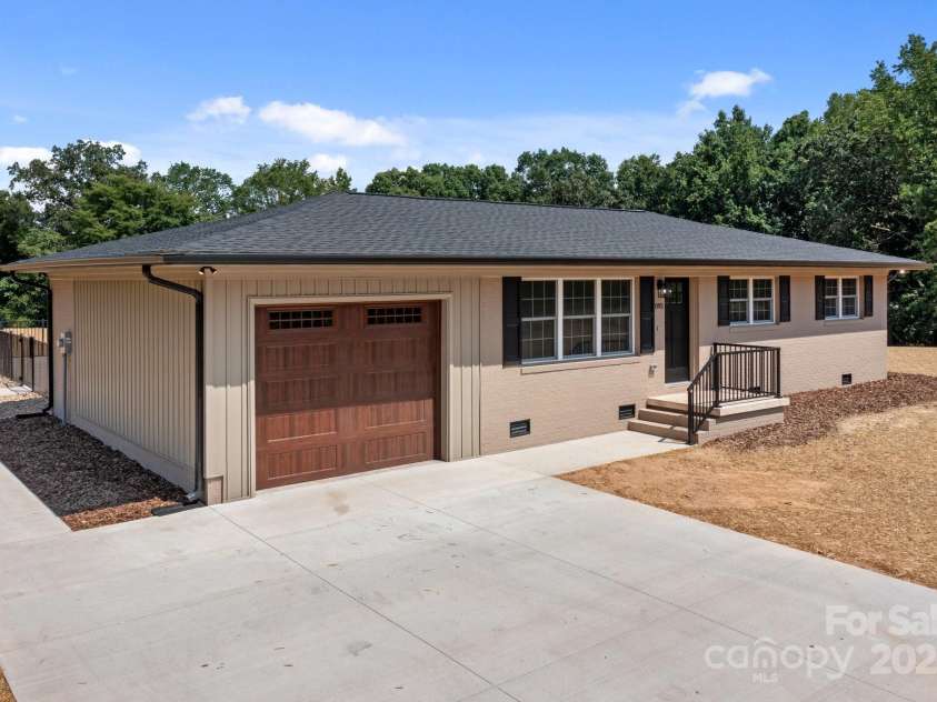 893 Chief Thomas Road, Harmony, NC 28634.  MLS# CAR4278148, YatesRealty ID 27073. Welcome to 893 Chief Thomas Rd — a beautifully renovated brick ranch