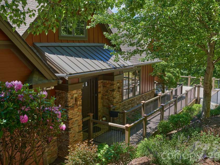 427 Spring Rock Road, Burnsville, NC 28714.  MLS# CAR4379071, YatesRealty ID 27075. Easy access with level walkway from driveway
