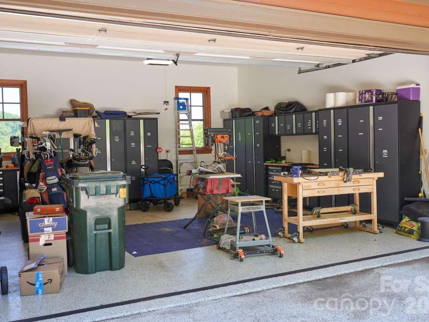 427 Spring Rock Road, Burnsville, NC 28714.  MLS# CAR4379071, YatesRealty ID 27075. Main-level; Oversized Two-Car Garage with Fresh Epoxy Coating