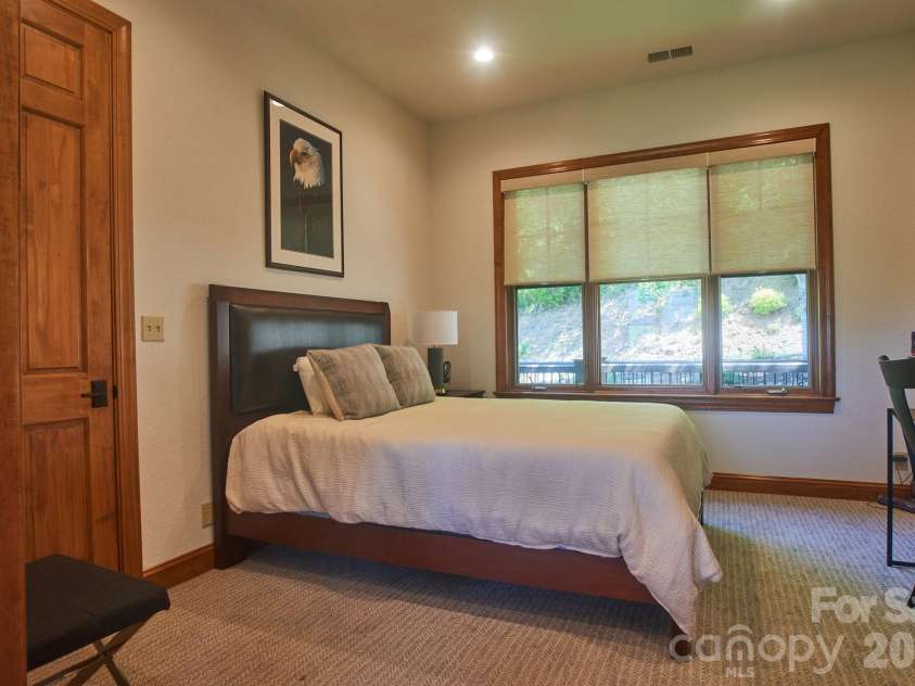 427 Spring Rock Road, Burnsville, NC 28714.  MLS# CAR4379071, YatesRealty ID 27075. Main level - Second Bedroom