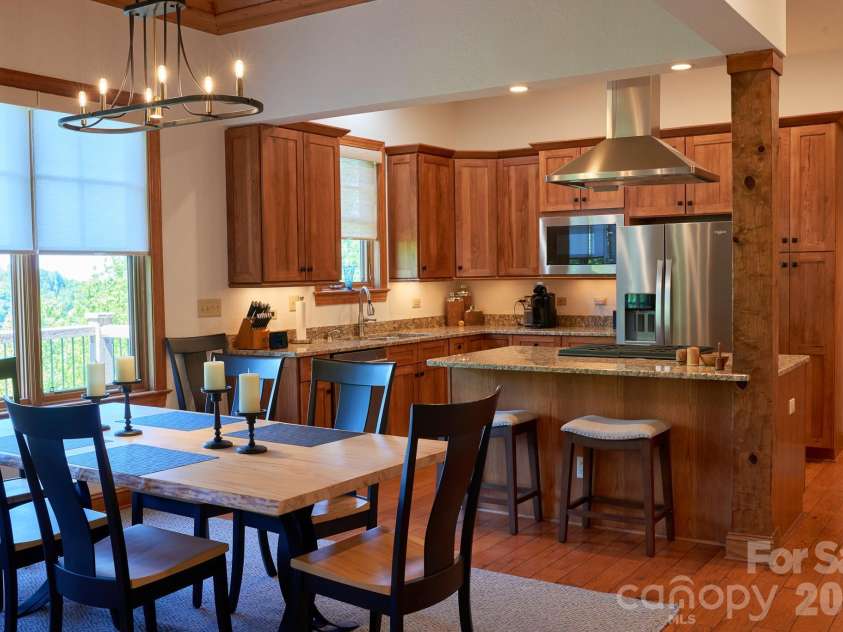427 Spring Rock Road, Burnsville, NC 28714.  MLS# CAR4379071, YatesRealty ID 27075. Open concept Dining area and Kitchen - Great for entertaining!