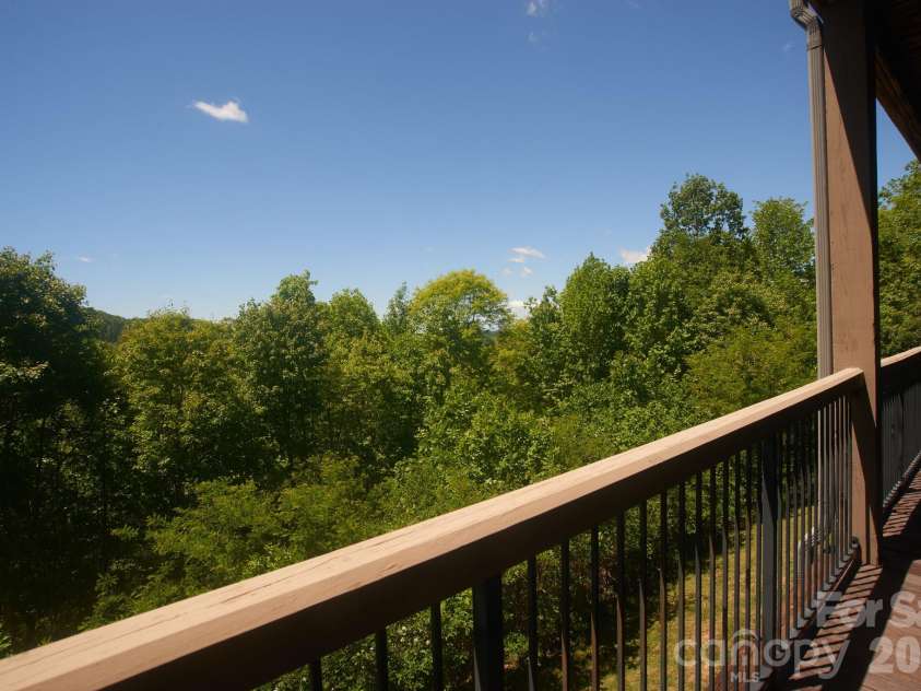 427 Spring Rock Road, Burnsville, NC 28714.  MLS# CAR4379071, YatesRealty ID 27075. Private and Serene!