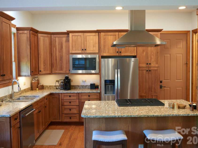 427 Spring Rock Road, Burnsville, NC 28714.  MLS# CAR4379071, YatesRealty ID 27075. Spacious Kitchen with new SS appliances