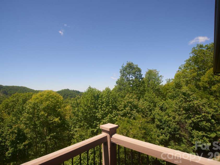 427 Spring Rock Road, Burnsville, NC 28714.  MLS# CAR4379071, YatesRealty ID 27075. Views at every angle
