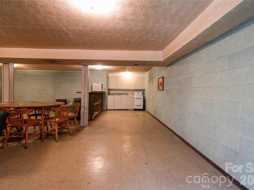 713 Pleasant Drive, Shelby, NC 28152.  MLS# CAR4355579, YatesRealty ID 27076. Basement Dining Area & Kitchen