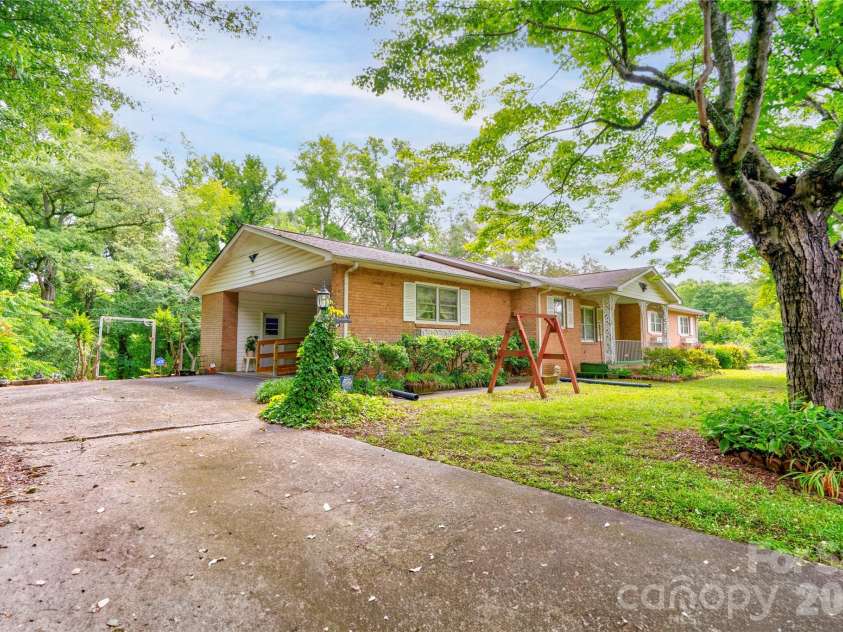 713 Pleasant Drive, Shelby, NC 28152.  MLS# CAR4355579, YatesRealty ID 27076. Front & Left Side