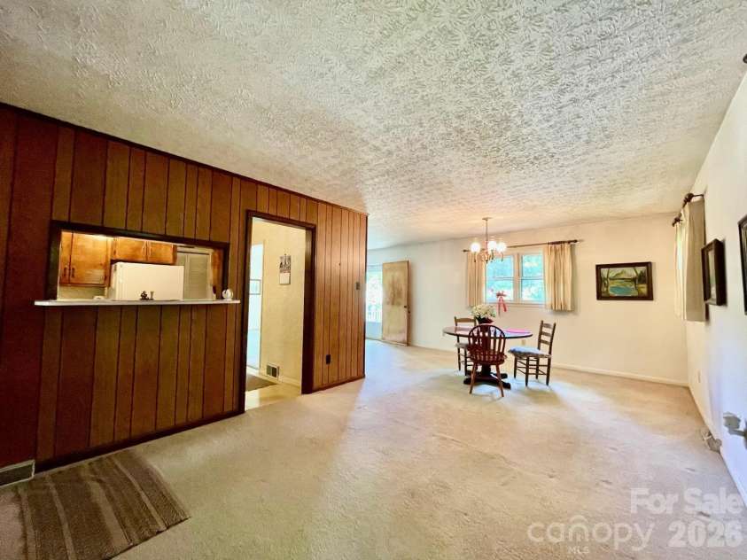 213 Park Lane, Black Mountain, NC 28711.  MLS# CAR4383127, YatesRealty ID 27077. Dining and living room.