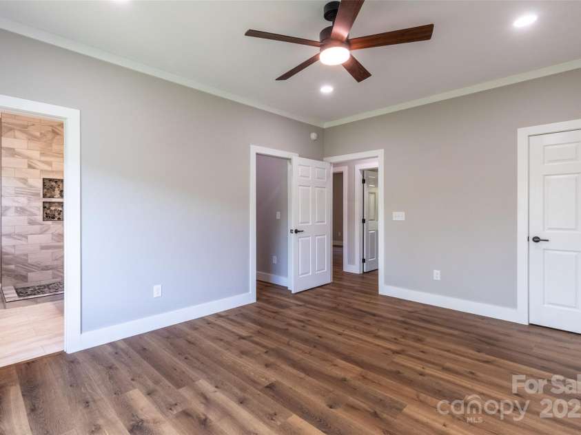 288 Blue Cedar Road, Sylva, NC 28779.  MLS# CAR4276447, YatesRealty ID 27081. Primary bedroom