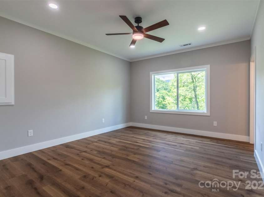 288 Blue Cedar Road, Sylva, NC 28779.  MLS# CAR4276447, YatesRealty ID 27081. Primary bedroom