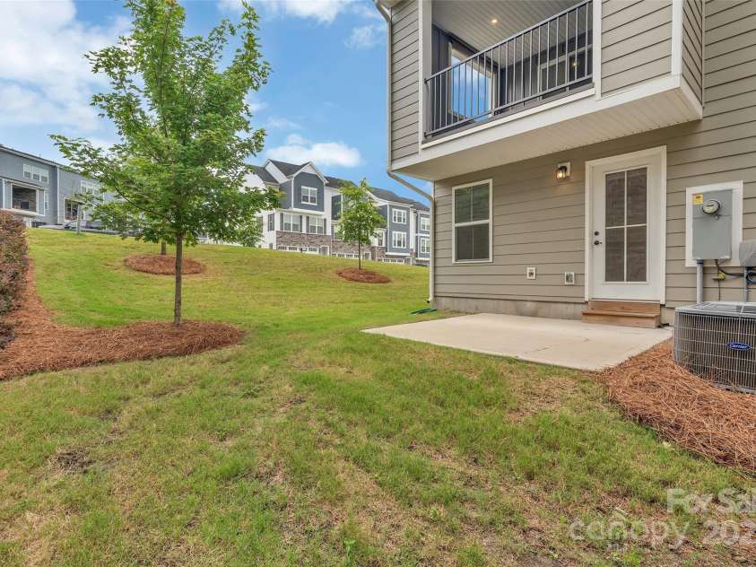 2004 Dornoch Road, Tega Cay, SC 29708.  MLS# CAR4279325, YatesRealty ID 27083. BAckyard