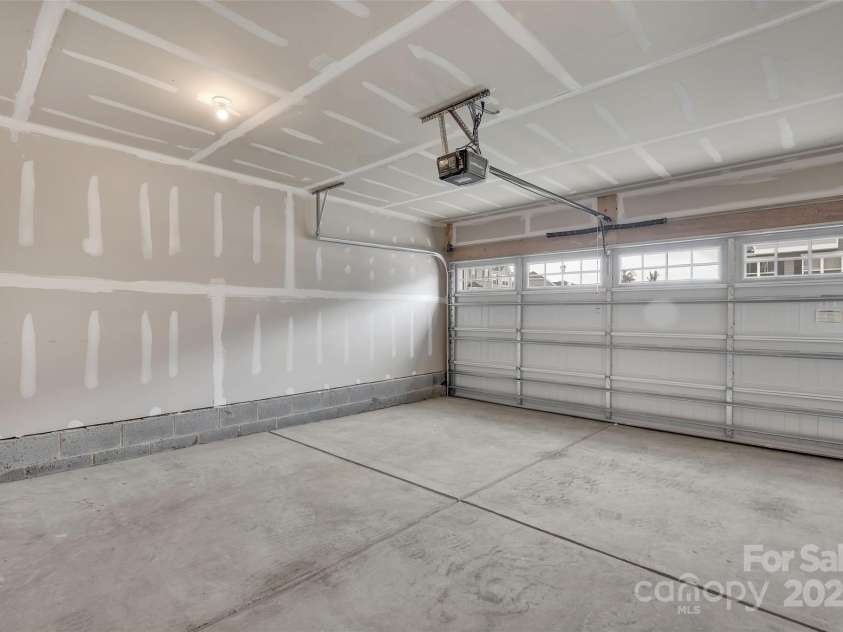 2004 Dornoch Road, Tega Cay, SC 29708.  MLS# CAR4279325, YatesRealty ID 27083. Garage 2 Car
