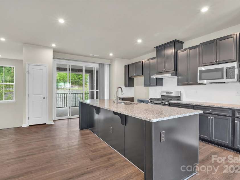 2004 Dornoch Road, Tega Cay, SC 29708.  MLS# CAR4279325, YatesRealty ID 27083. Kitchen with large Island