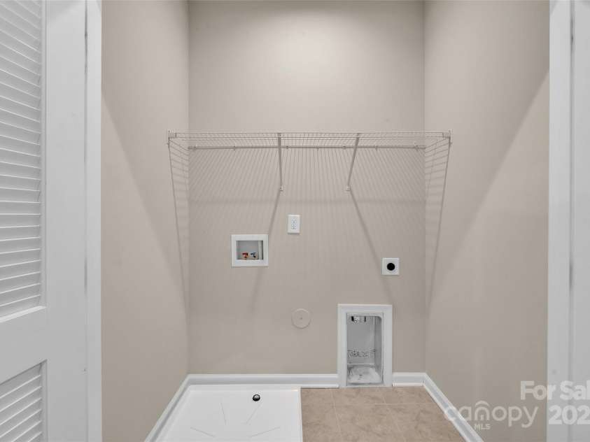 2004 Dornoch Road, Tega Cay, SC 29708.  MLS# CAR4279325, YatesRealty ID 27083. Laundry