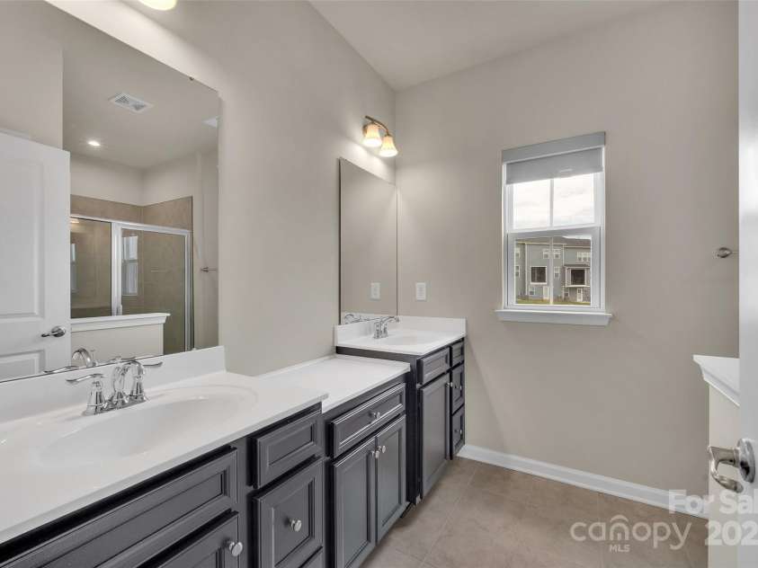2004 Dornoch Road, Tega Cay, SC 29708.  MLS# CAR4279325, YatesRealty ID 27083. Primary Bath