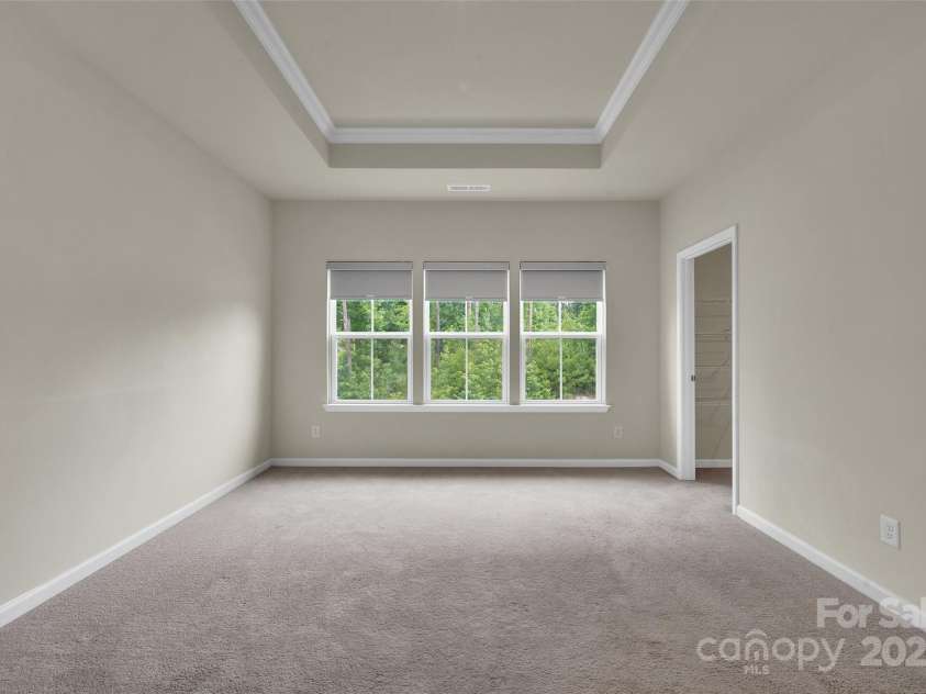 2004 Dornoch Road, Tega Cay, SC 29708.  MLS# CAR4279325, YatesRealty ID 27083. Primary Bedroom