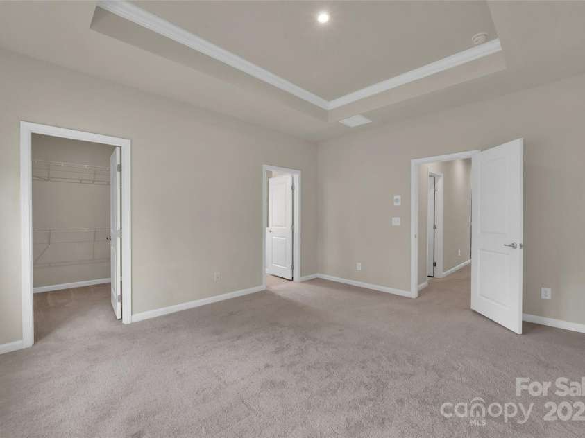 2004 Dornoch Road, Tega Cay, SC 29708.  MLS# CAR4279325, YatesRealty ID 27083. Primary Bedroom