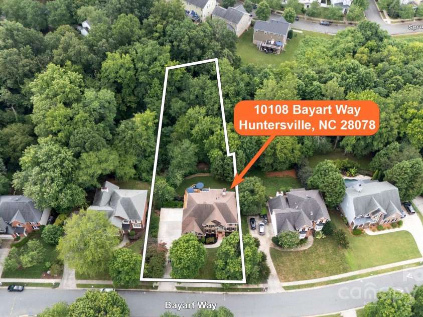 10108 Bayart Way, Huntersville, NC 28078.  MLS# CAR4280969, YatesRealty ID 27084. Large .58 acre lot with mature trees offering privacy and serenity