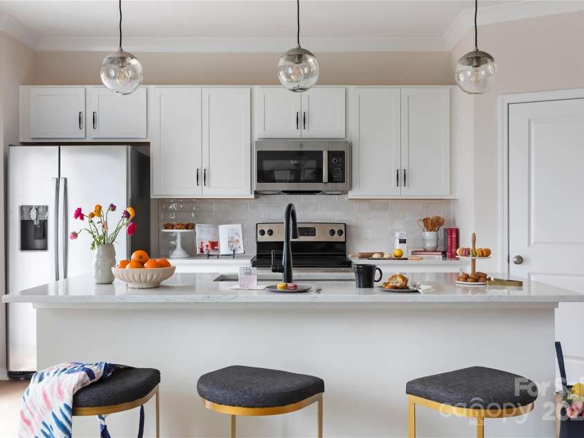 2308 Endeavor Run, Charlotte, NC 28269.  MLS# CAR4281796, YatesRealty ID 27085. The Anson | Fifteen 15 Cannon *actual finishes, structural selections, and orientation may vary.
