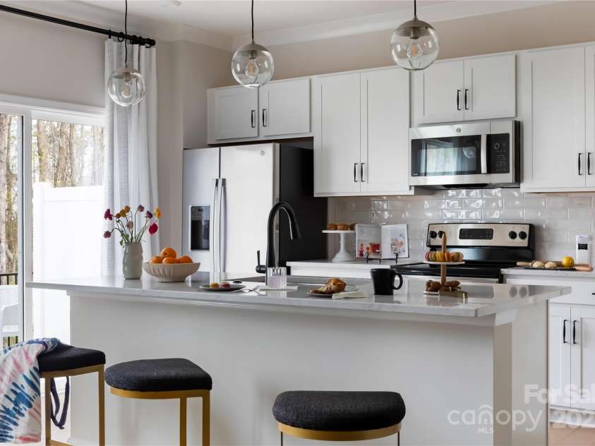 2308 Endeavor Run, Charlotte, NC 28269.  MLS# CAR4281796, YatesRealty ID 27085. The Anson | Fifteen 15 Cannon *actual finishes, structural selections, and orientation may vary.