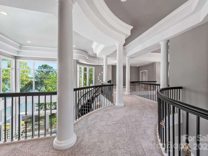 102 Eastham Court, Mooresville, NC 28117.  MLS# CAR4247937, YatesRealty ID 27092. 2nd floor walkway