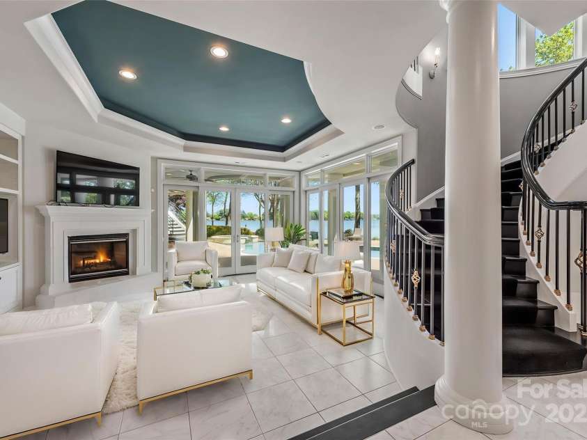 102 Eastham Court, Mooresville, NC 28117.  MLS# CAR4247937, YatesRealty ID 27092. Downstairs entertainment space near bar and entertainment rooms