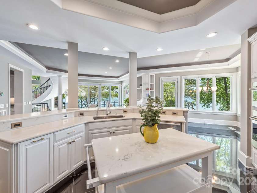 102 Eastham Court, Mooresville, NC 28117.  MLS# CAR4247937, YatesRealty ID 27092. Entertainers kitchen with gorgeous lake views