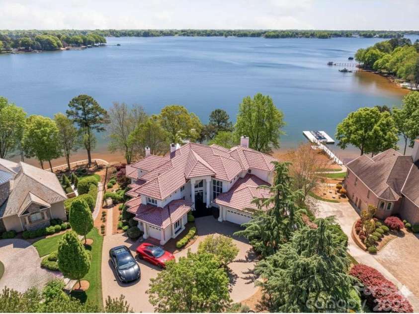 102 Eastham Court, Mooresville, NC 28117.  MLS# CAR4247937, YatesRealty ID 27092. Exotic cars in your waterfront circle driveway